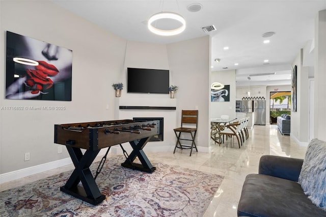 dining area with a healthy amount of sunlight and a chandelier