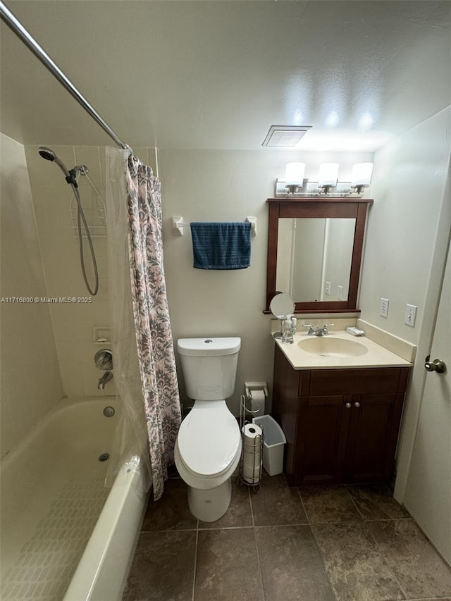 full bathroom with vanity, shower / tub combo, and toilet