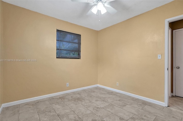 empty room featuring ceiling fan