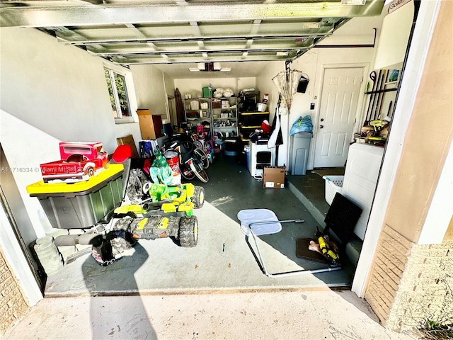 garage featuring a garage door opener