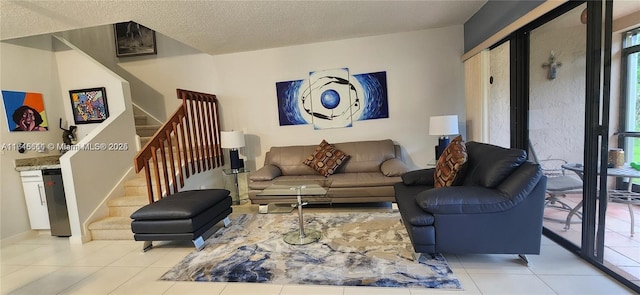 tiled living room with a textured ceiling