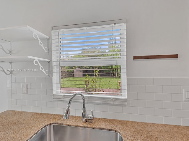 kitchen with sink and backsplash