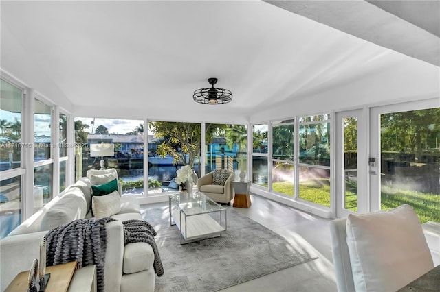 sunroom with a water view