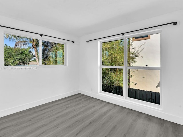 empty room featuring hardwood / wood-style floors