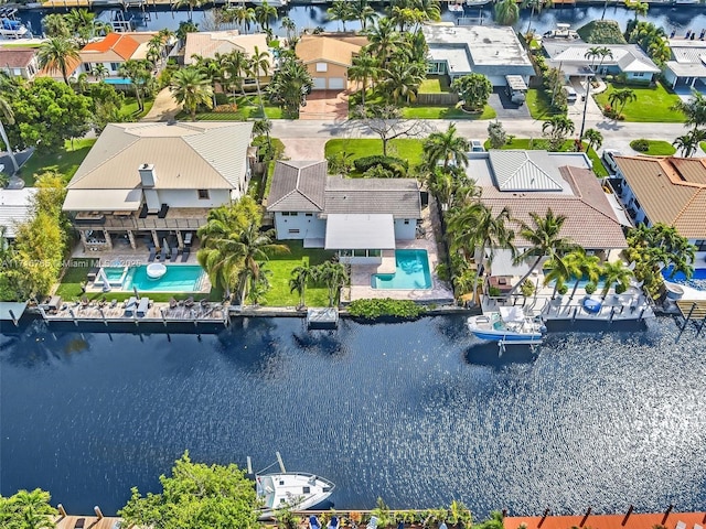 birds eye view of property featuring a water view