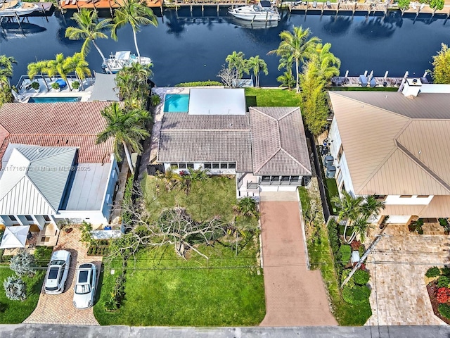 birds eye view of property featuring a water view