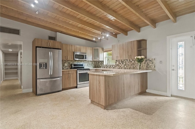 kitchen featuring kitchen peninsula, appliances with stainless steel finishes, plenty of natural light, and wooden ceiling