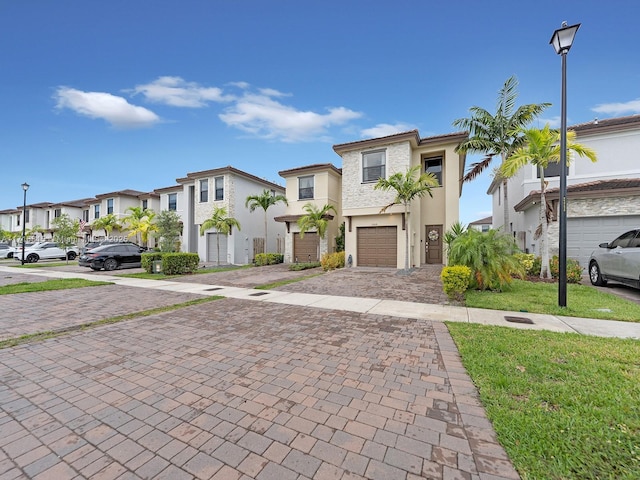 view of front of property with a garage