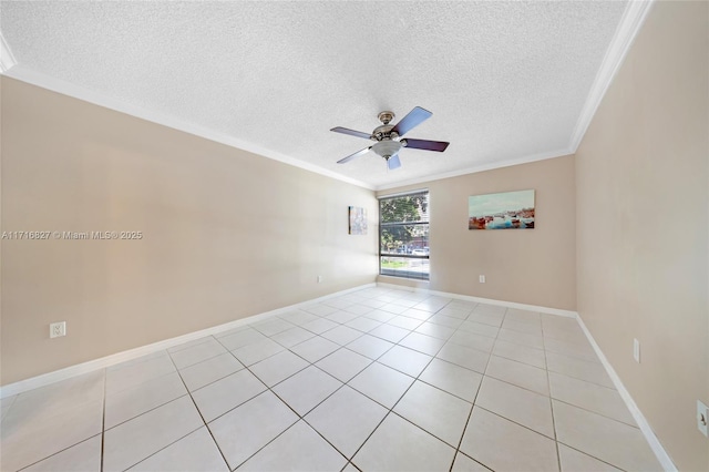 tiled empty room featuring a textured ceiling, ceiling fan, and ornamental molding