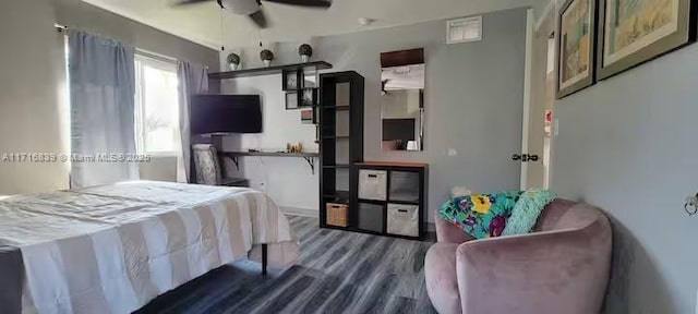 bedroom featuring ceiling fan and dark wood-type flooring