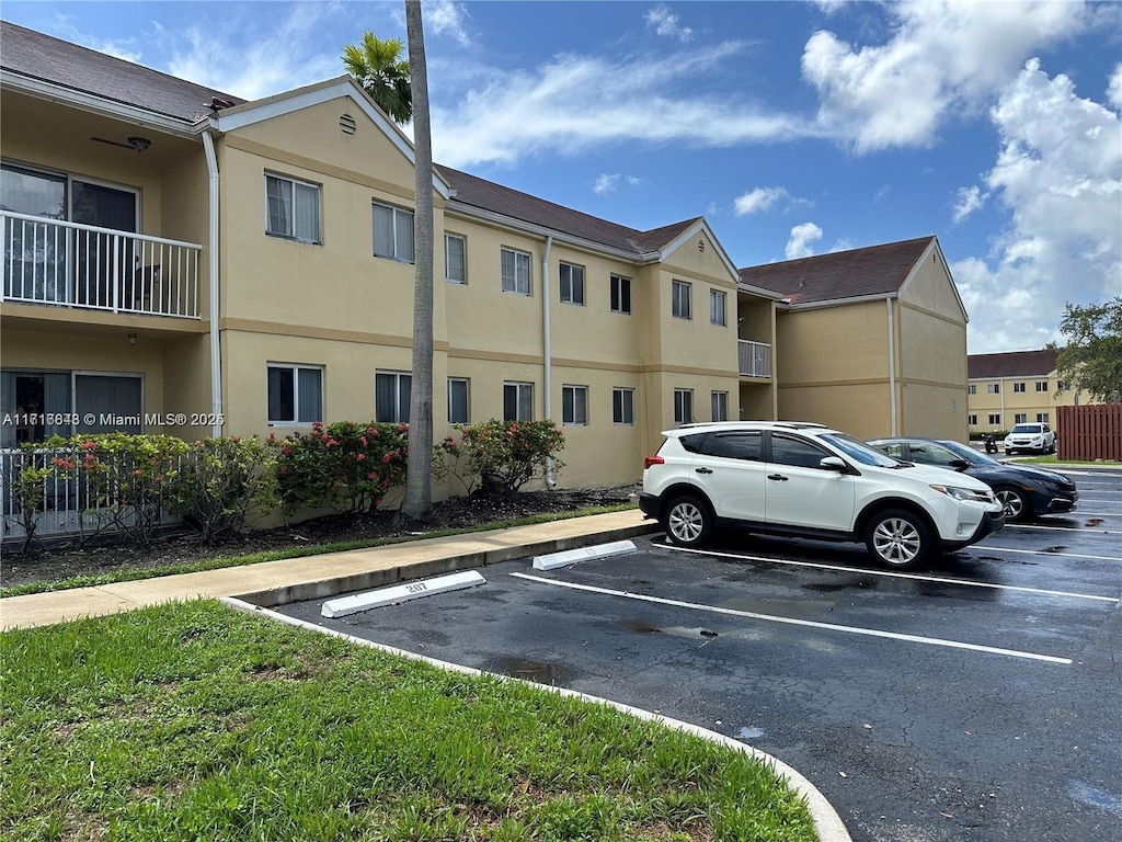 view of parking / parking lot