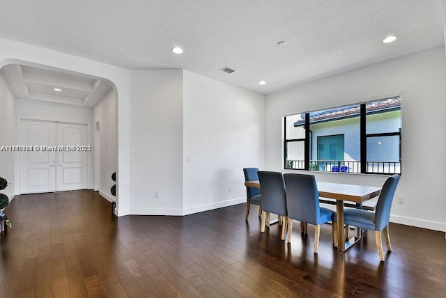 dining room with dark hardwood / wood-style floors