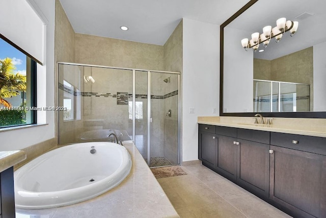 bathroom with vanity and plus walk in shower