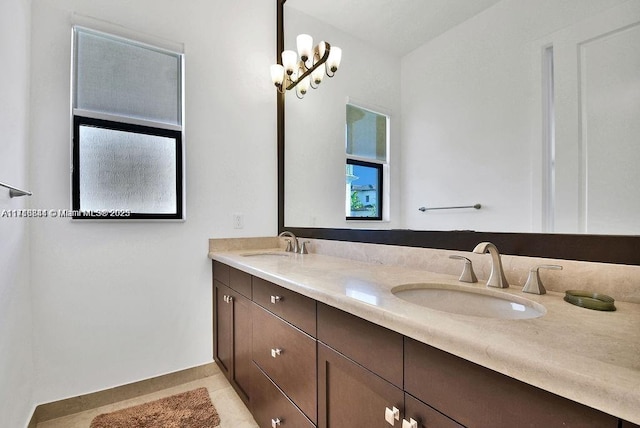 bathroom with tile patterned floors and vanity