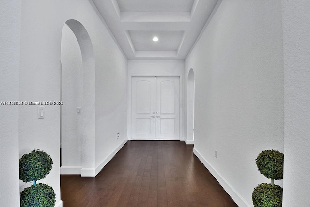 hallway featuring dark hardwood / wood-style flooring