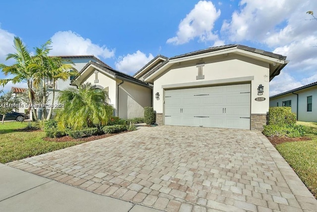 single story home featuring a garage