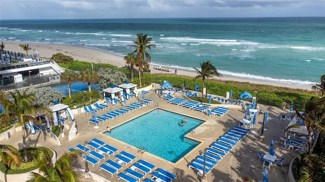 aerial view featuring a water view and a view of the beach