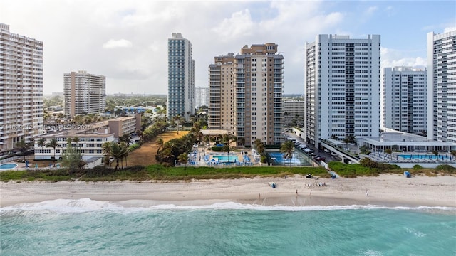 bird's eye view with a view of city, a beach view, and a water view