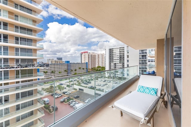 balcony featuring a city view