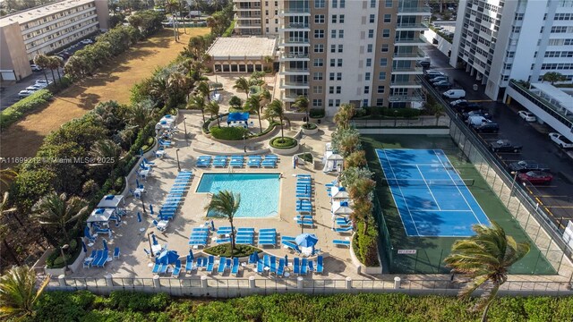 exterior space with a water view and a view of the beach