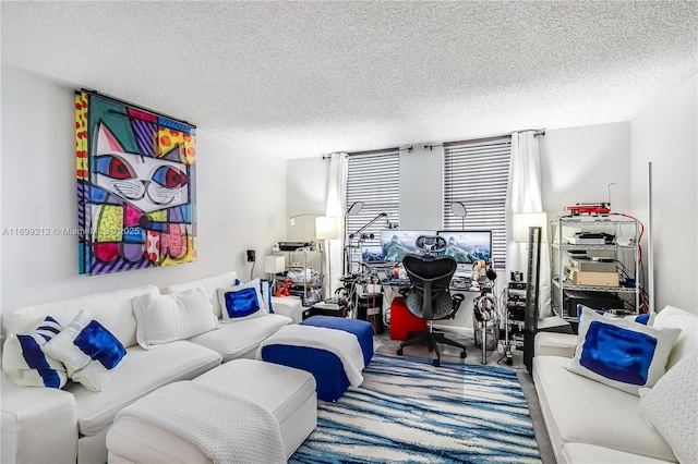 carpeted living room featuring a textured ceiling