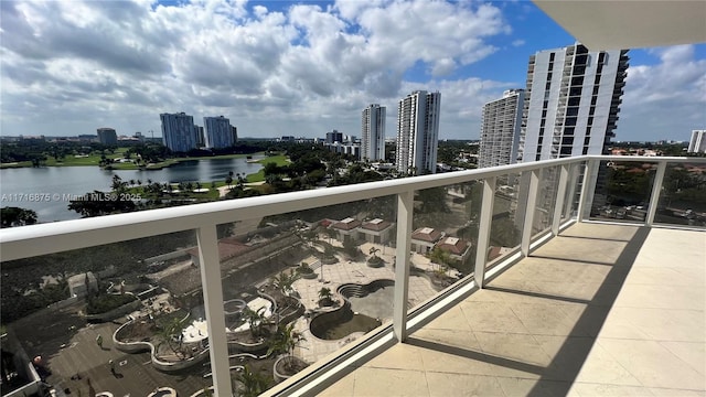 balcony featuring a water view