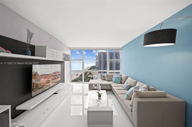 tiled living room with expansive windows