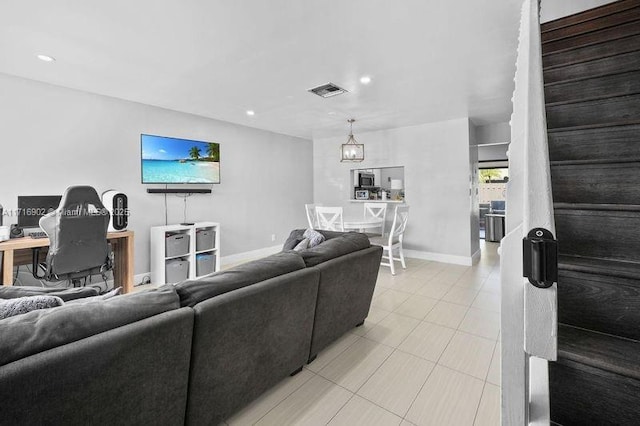 living room with a notable chandelier