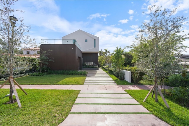 exterior space with a front lawn