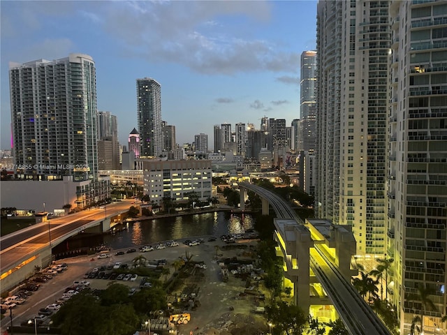 property's view of city featuring a water view