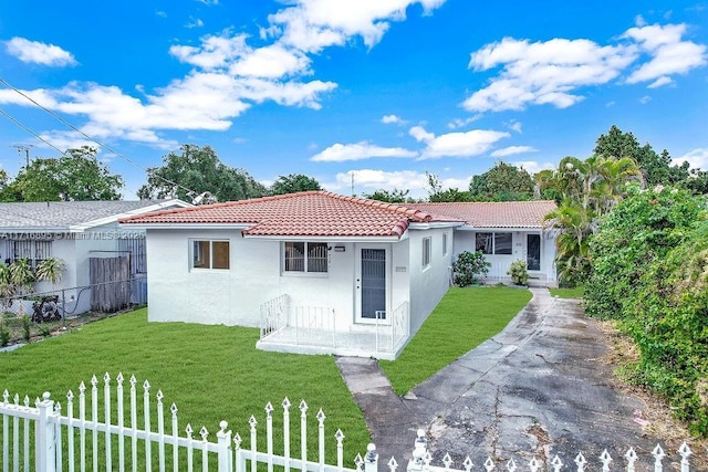 back of house with a yard