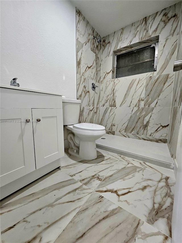 bathroom with toilet and walk in shower