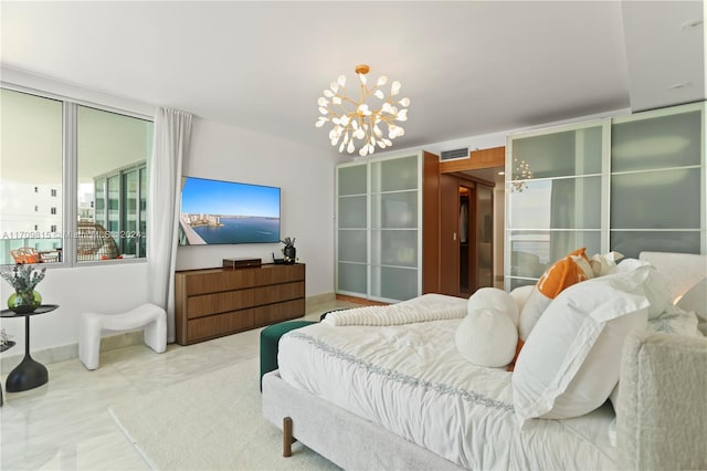 bedroom featuring a chandelier