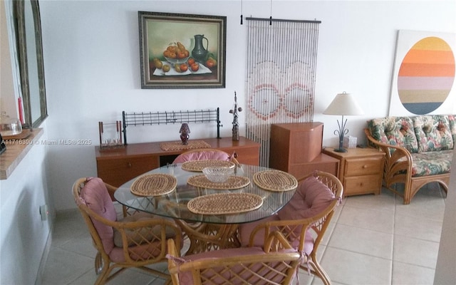 dining room with light tile patterned floors