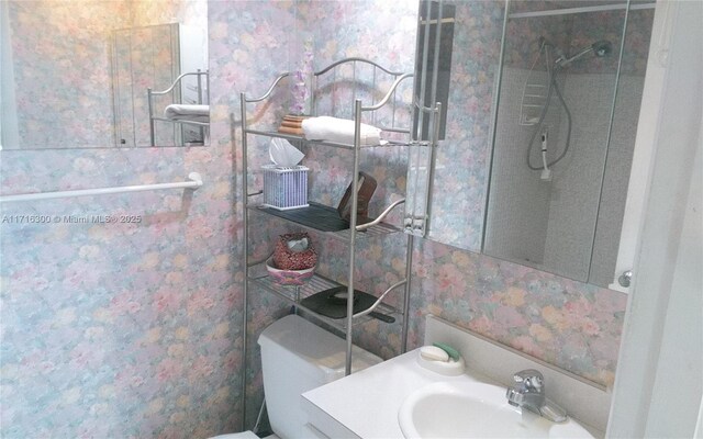 bathroom with toilet and sink