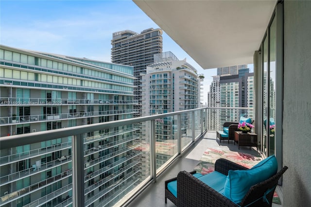 balcony featuring a city view