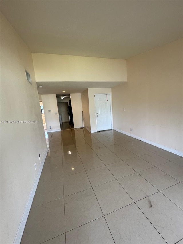 view of tiled spare room