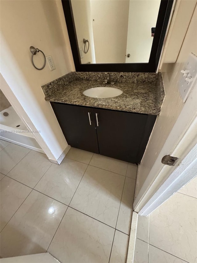 bathroom featuring vanity and tile patterned floors