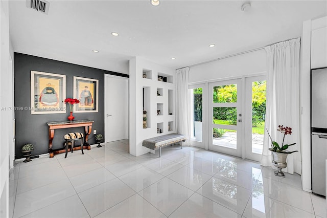 interior space featuring light tile patterned floors