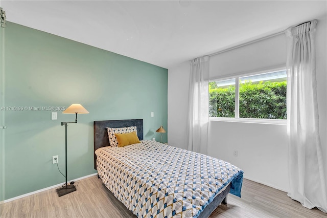 bedroom featuring hardwood / wood-style floors