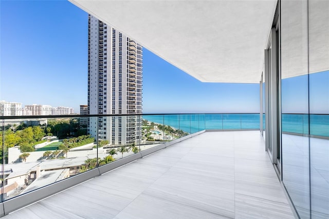 balcony featuring a water view