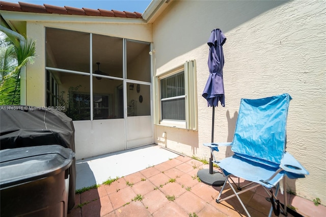 view of patio with a sunroom and grilling area