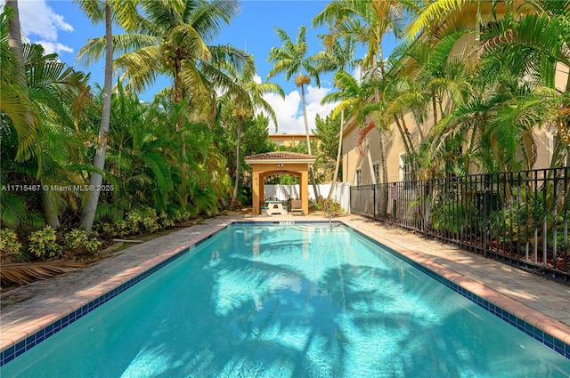 view of swimming pool with a gazebo