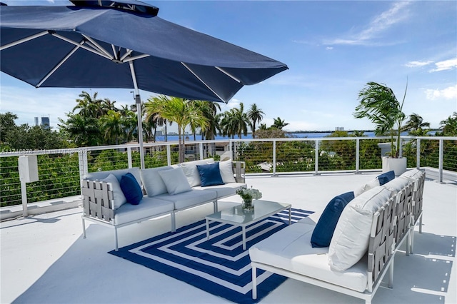 view of patio with a balcony and an outdoor hangout area