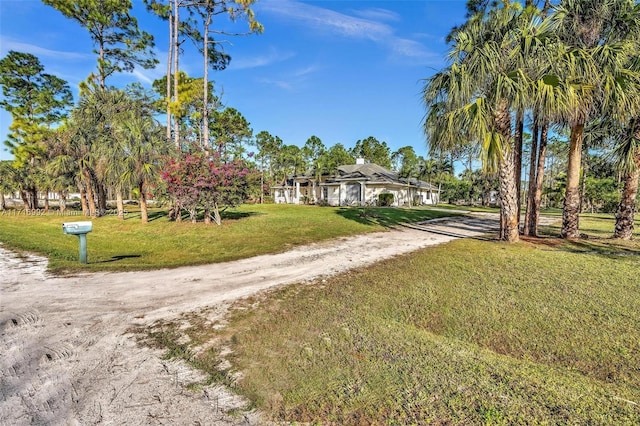 exterior space featuring a lawn