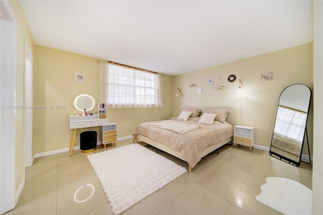 bedroom featuring tile patterned floors