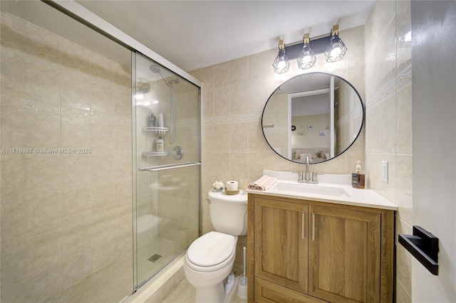 bathroom with walk in shower, toilet, tile walls, vanity, and backsplash