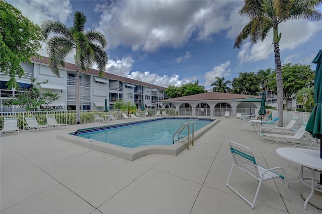 view of swimming pool featuring a patio