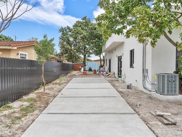 view of yard with a patio area and cooling unit