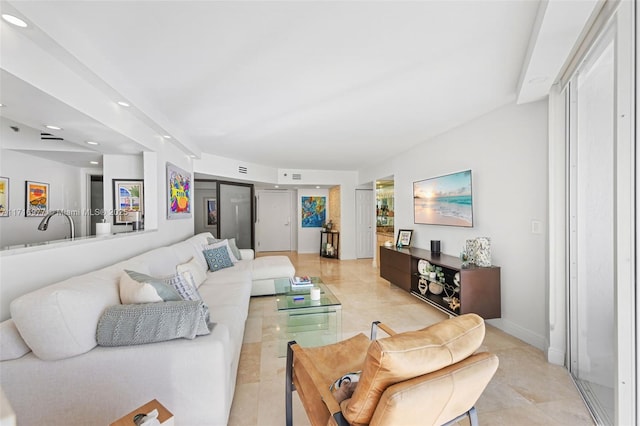 living room featuring light tile patterned floors